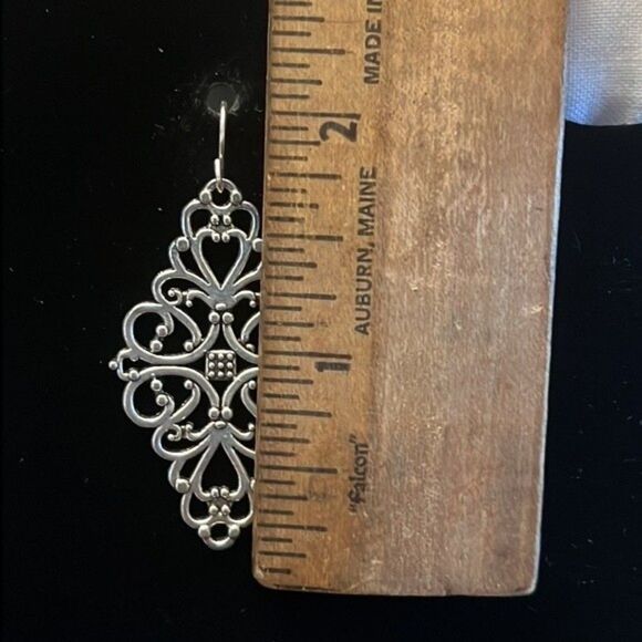 Handcrafted silver tone scroll earrings. - Picture 3 of 4